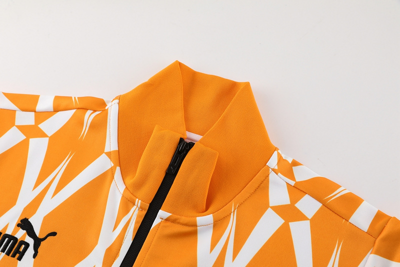 23 Ivory Coast Orange Suit